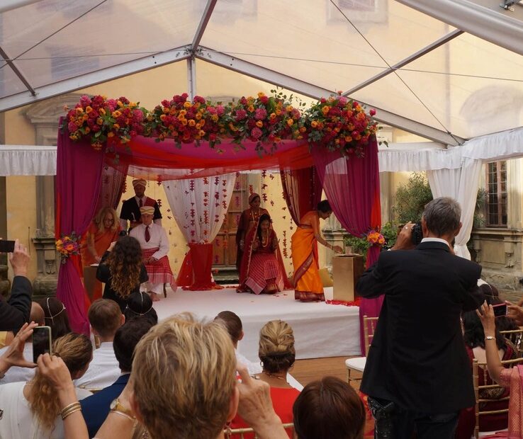 A Hindu wedding ceremony beneath the mandap at a villa in Italy