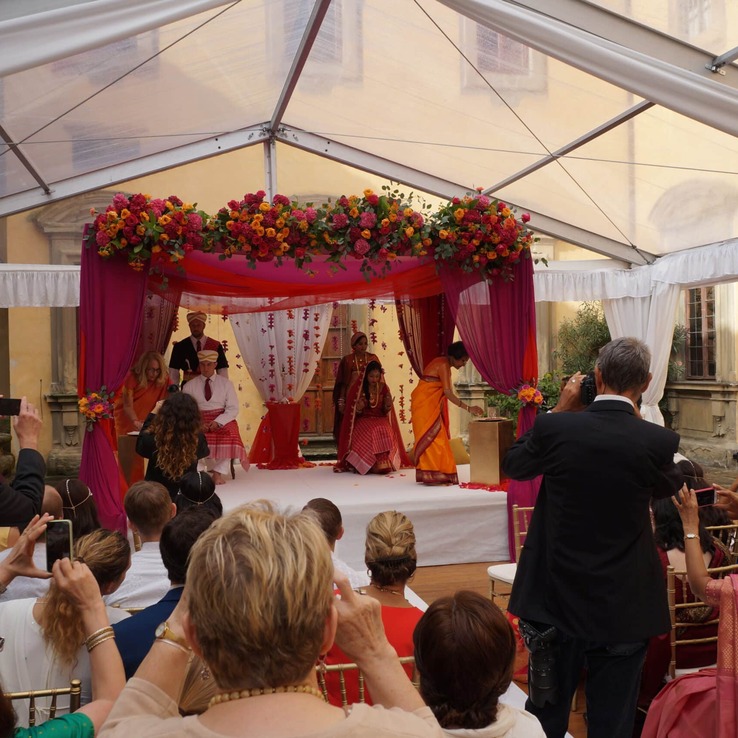 A Hindu wedding ceremony beneath the mandap at a villa in Italy