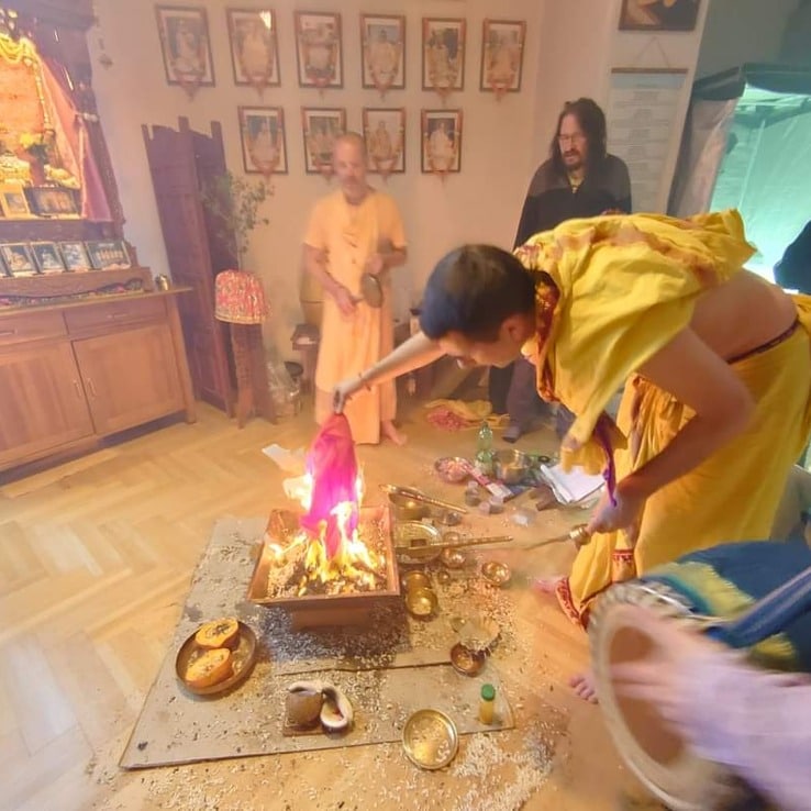 Offerings being made into the sacred fire during a Vedic Homa