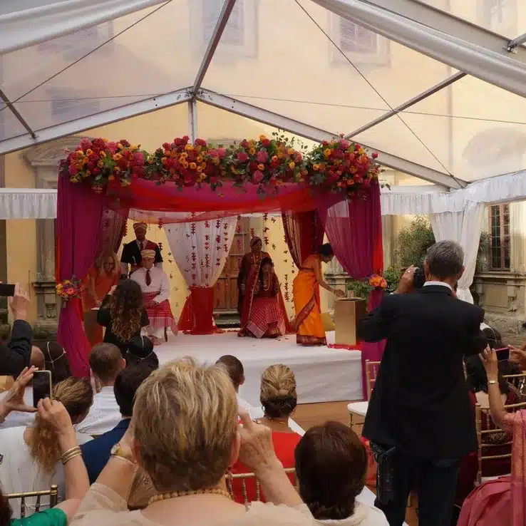 A Hindu wedding ceremony beneath the mandap at a villa in Italy